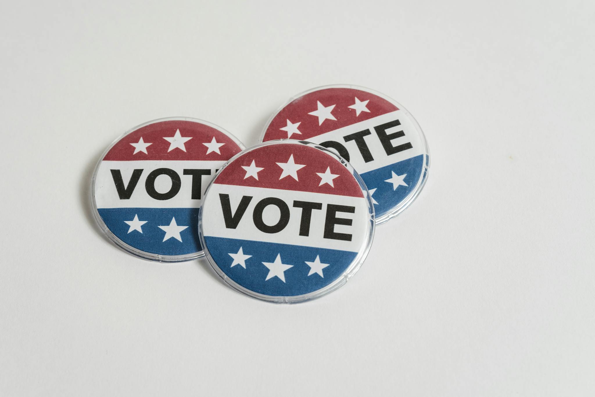 US Voting Badges on White Surface