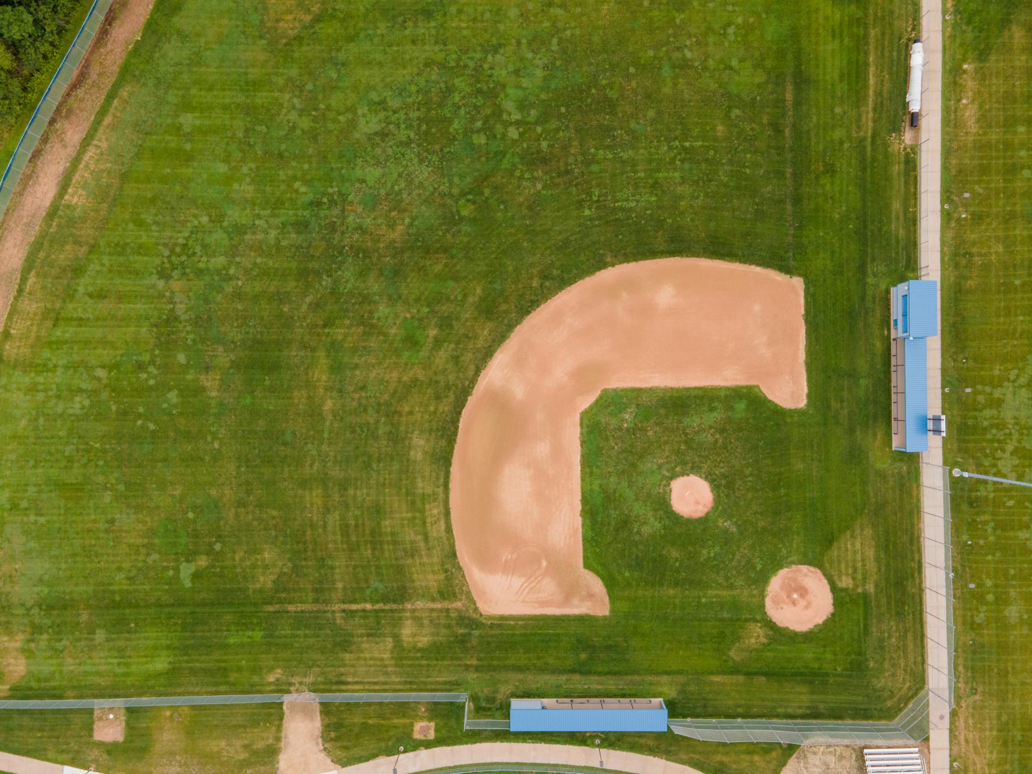 Drone shot of a baseball field in Menomonie, Wisconsin with visible boundaries.