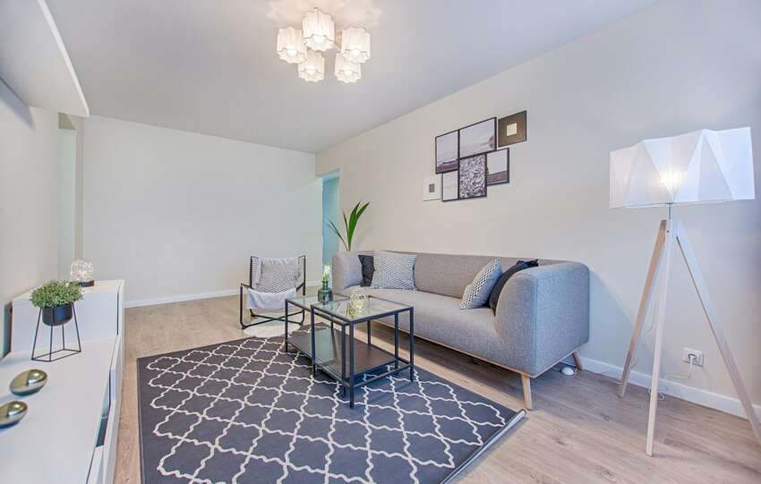 Sleek and stylish living room with modern furniture and minimalist decor in a contemporary apartment.