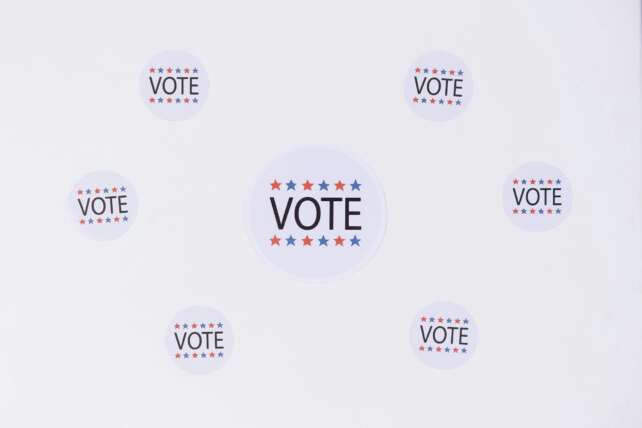 Circular stickers with 'Vote' text and stars emphasizing a voting campaign.