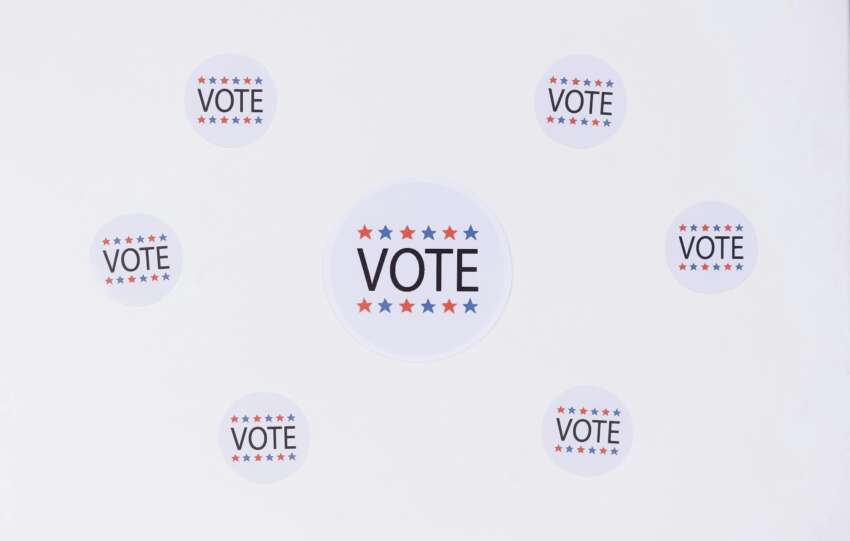 Circular stickers with 'Vote' text and stars emphasizing a voting campaign.